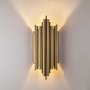 Vegglampe i gullfinish - Munnspill